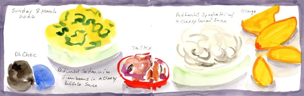 Watercolor food sketch on a double page spread, Sunday 8 March 2026, with a soft grey-purple border wash. On the left, dark chocolate pieces and a blue oval sit beside a large yellow-green pasta bowl. In the center, a small red-rimmed bowl holds a colorful trail mix. On the right, a pale grey bowl of red lentil spaghetti in a cheesy lemon sauce sits beside bright orange wedges of fresh orange. Food names are handwritten throughout.