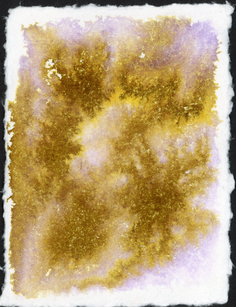 A full page chromatography study on handmade deckle-edge cotton watercolor paper. Noodler's Rome Burning ink spreads across the page in rich gold and ochre tones, with soft lavender separation blooming outward at the edges. The fibrous texture of the handmade paper creates a dramatic, organic surface. January 2026.