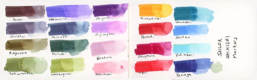 A double page spread showing a full color swatch reference chart for Sailor Shikiori markers, with each color labeled in handwriting. Left page includes Doyou, Chushu, Rikyucha, Tokiwamatsu, Neosumire, Shimoyo, Miruai, Wakauguisu, Shigure, Fujisugata, Yozakura, and Sakuramori. Right page includes Kinmokusei, Yodaki, Okuyama, Irori, Yamadori, Souten, Yukiakari, and Yonaga. The swatches show the full range from deep browns and greens through purples, pinks, reds, oranges, and blues.