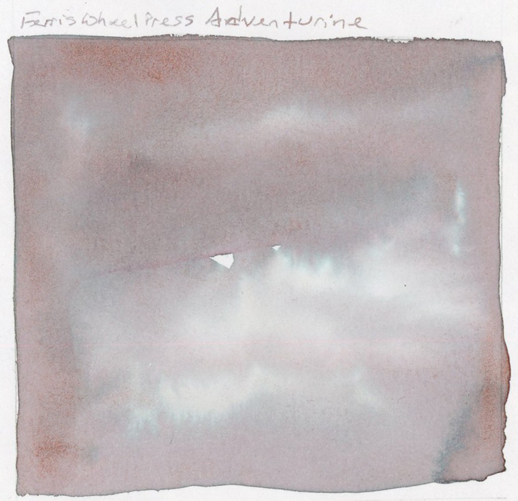 A large soft ink wash swatch on white sketchbook paper, labeled Ferris Wheel Press Adventurine in the artist's handwriting above. The wash is a dusty rosy grey with subtle shimmer and soft pink undertones, spreading in a slightly uneven rectangular shape with organic edges. Stillman and Birn Alpha sketchbook.